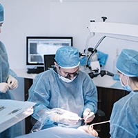 dentist performing dental implant surgery in Temple