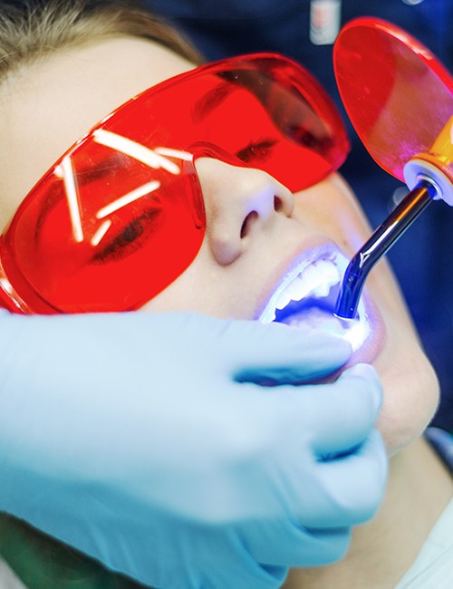 Patient receiving cosmetic dental bonding