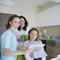 Woman at consultation with cosmetic dentist