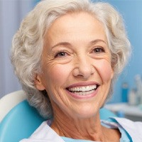 Smiling senior female dental patient