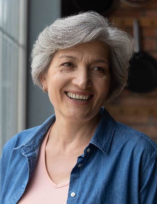 Woman smiling with dentures