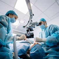 a dentist placing a dental implant