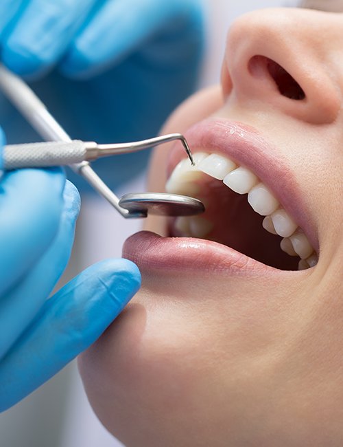 Patient receiving scaling and root planing periodontal therapy