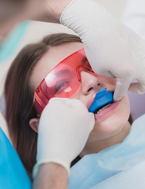 Patient receiving fluoride treatment