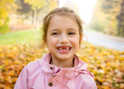 Little girl smiling after children's dentistry visit