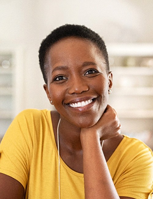 happy mature woman with tooth-colored fillings in Temple