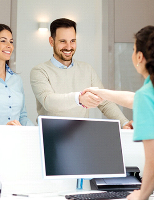 man meeting a receptionist